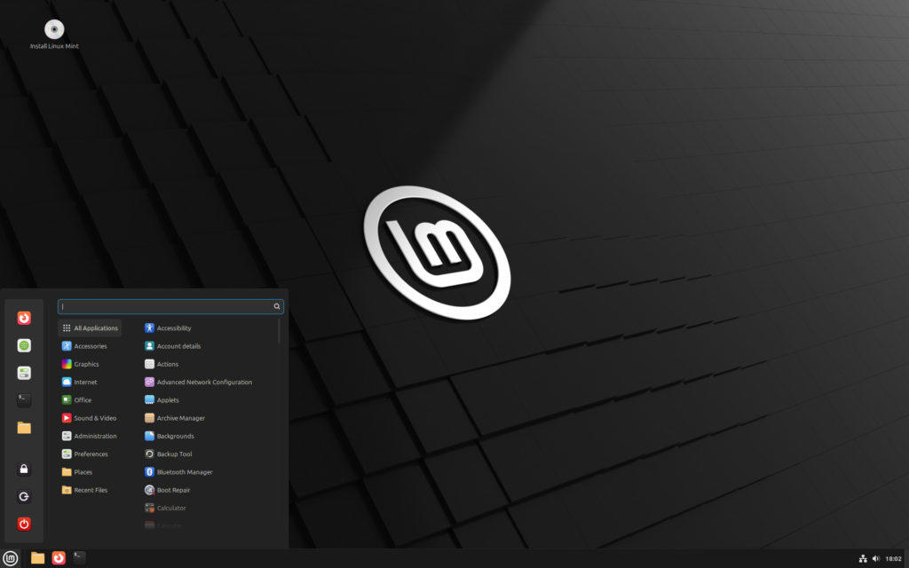 Escritorio de Linux Mint con el escritorio desplegado.
